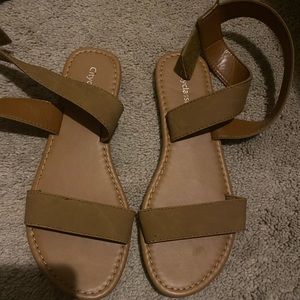Brown sandals that go over your ankles worn twice